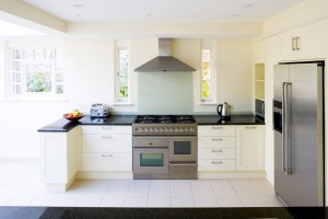 Spray-painted Kitchen with granite worktops.