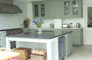 Hand-painted Kitchen with two types of stone worksurface.