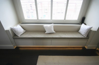 Bedroom Window Seat with drawers and concealing heating and air-conditioning system.  Spray-painted.