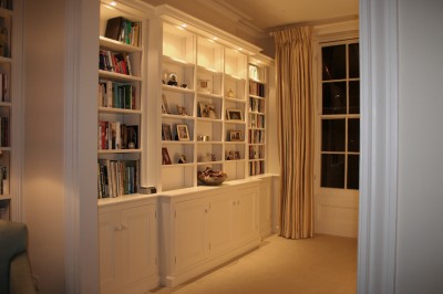 Hand-painted bookcase with lighting.